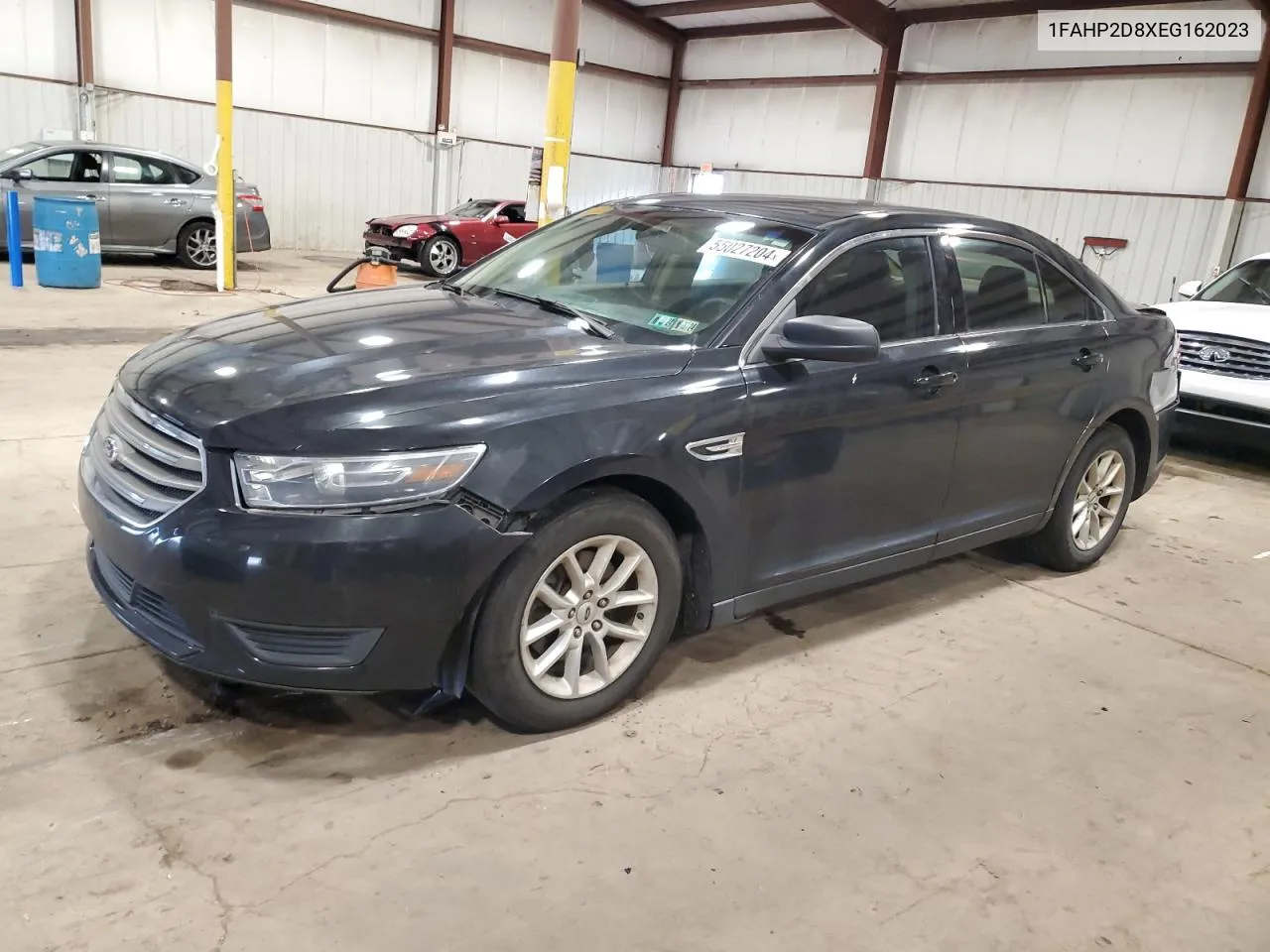 1FAHP2D8XEG162023 2014 Ford Taurus Se