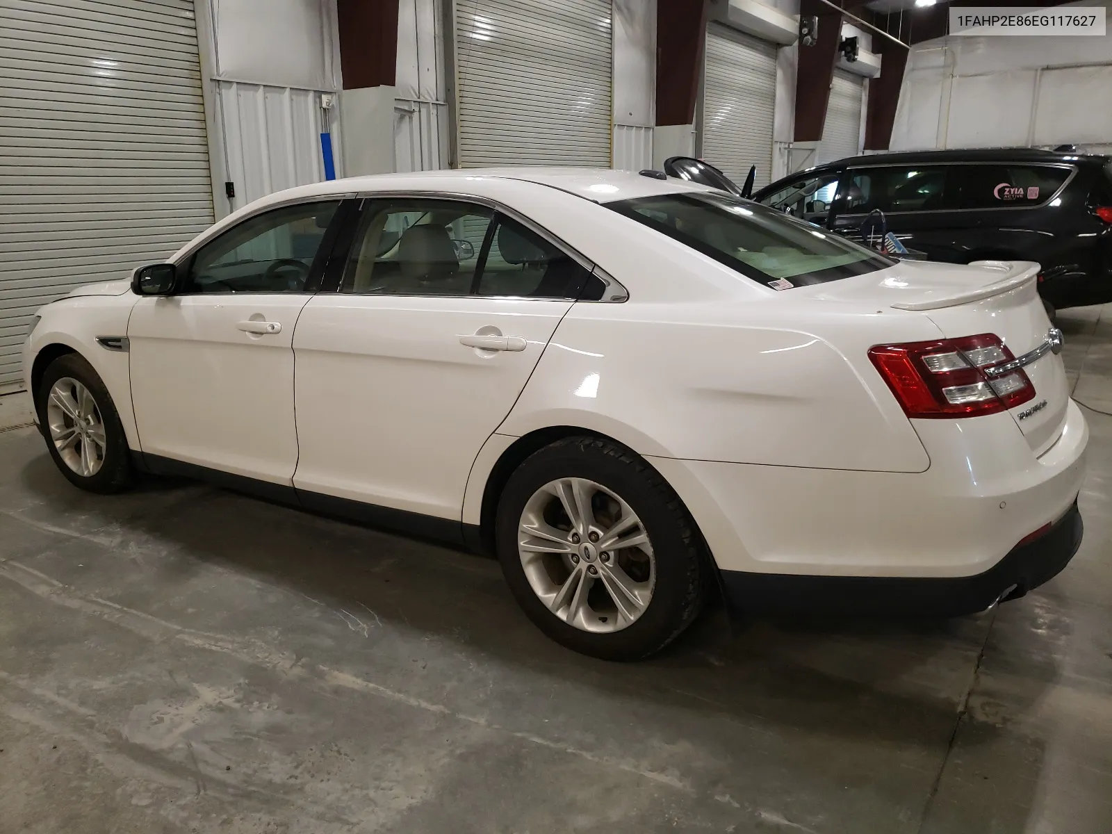 2014 Ford Taurus Sel VIN: 1FAHP2E86EG117627 Lot: 61542444