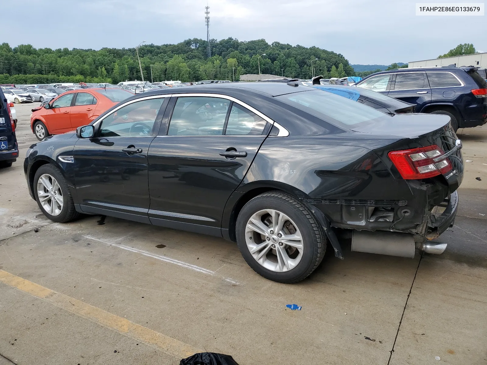 2014 Ford Taurus Sel VIN: 1FAHP2E86EG133679 Lot: 63789924