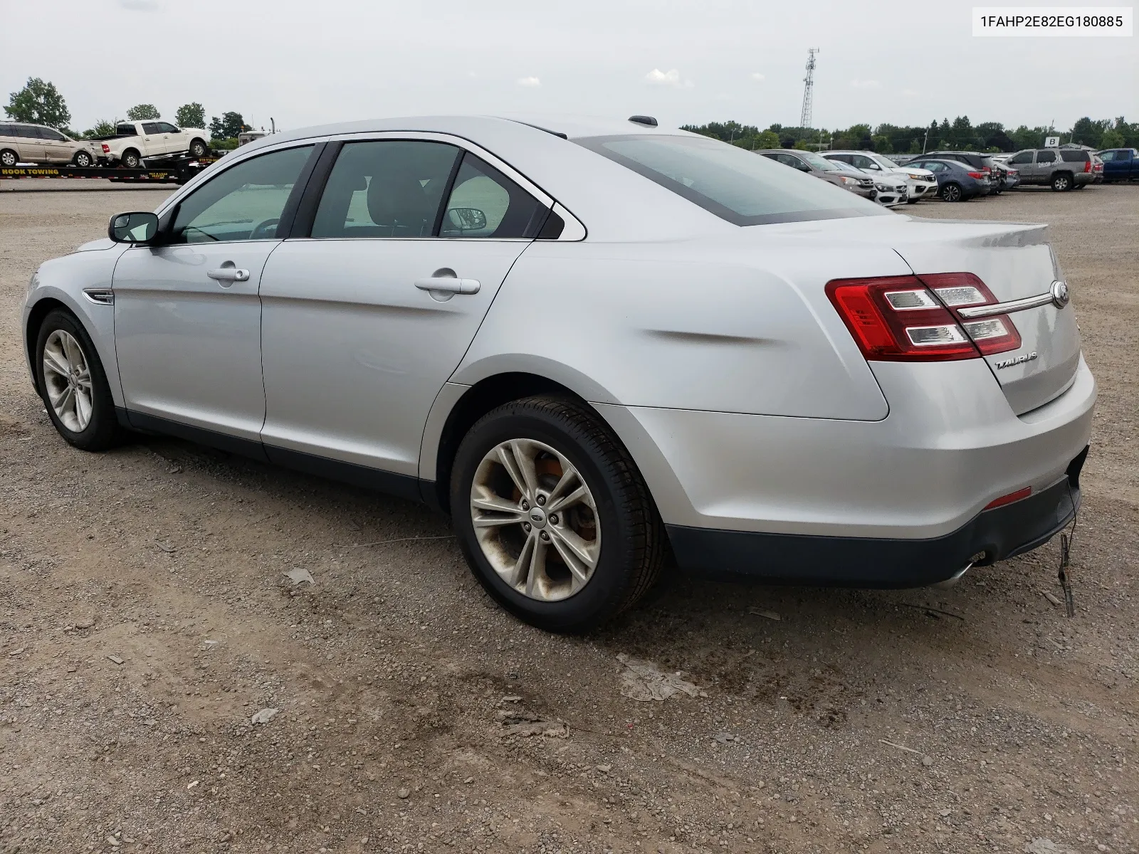 2014 Ford Taurus Sel VIN: 1FAHP2E82EG180885 Lot: 64005414