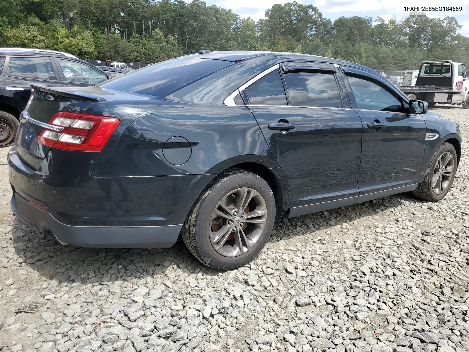 2014 Ford Taurus Sel VIN: 1FAHP2E85EG184669 Lot: 68063104