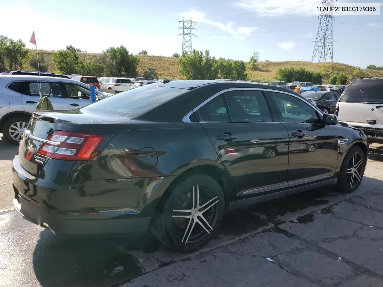 2014 Ford Taurus Limited VIN: 1FAHP2F83EG179386 Lot: 70642544