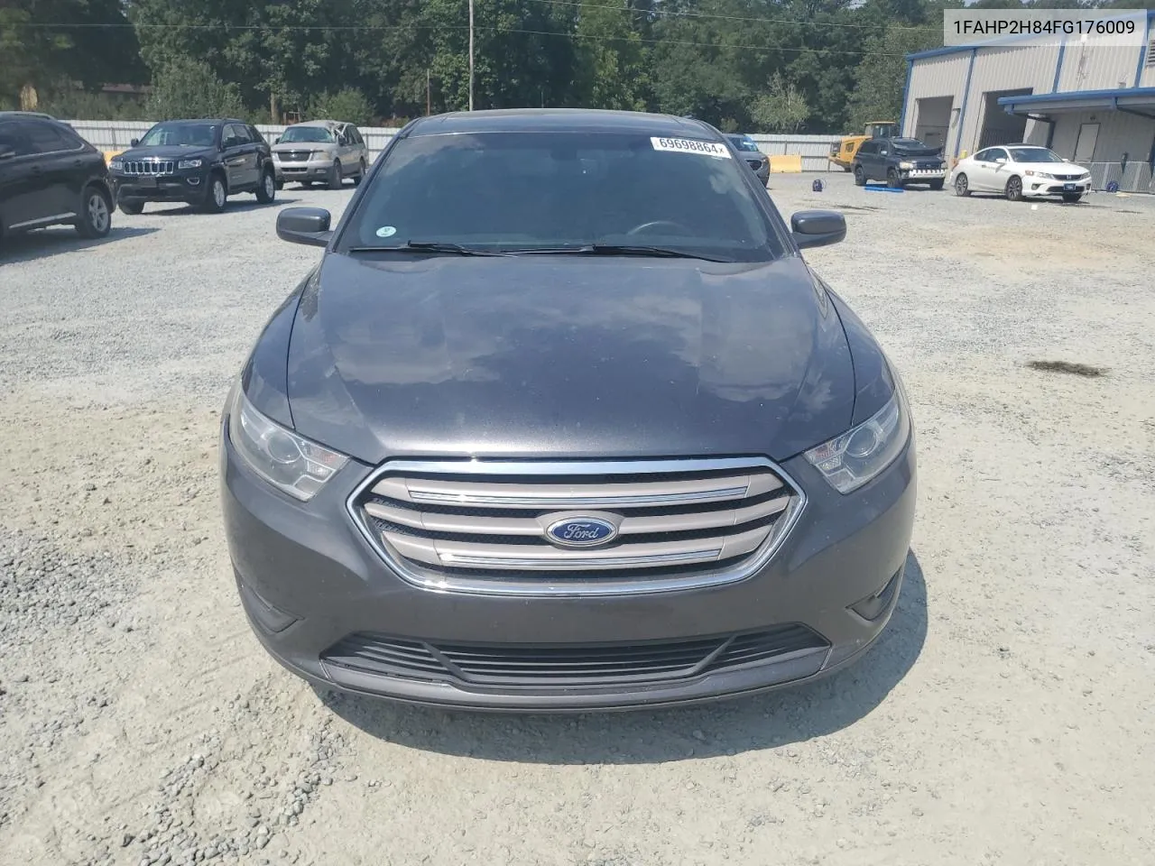 2015 Ford Taurus Sel VIN: 1FAHP2H84FG176009 Lot: 69698864