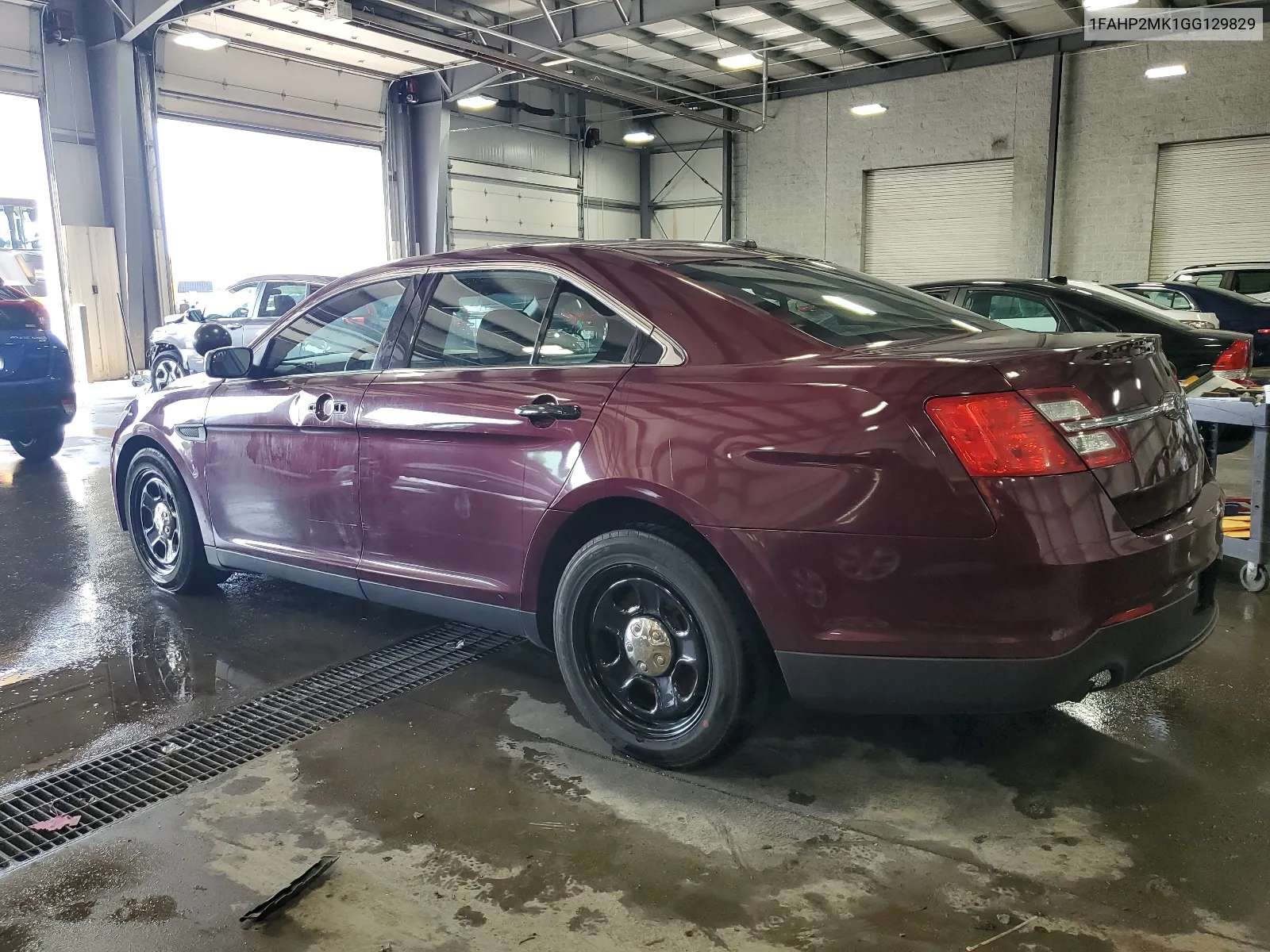 2016 Ford Taurus Police Interceptor VIN: 1FAHP2MK1GG129829 Lot: 64705604