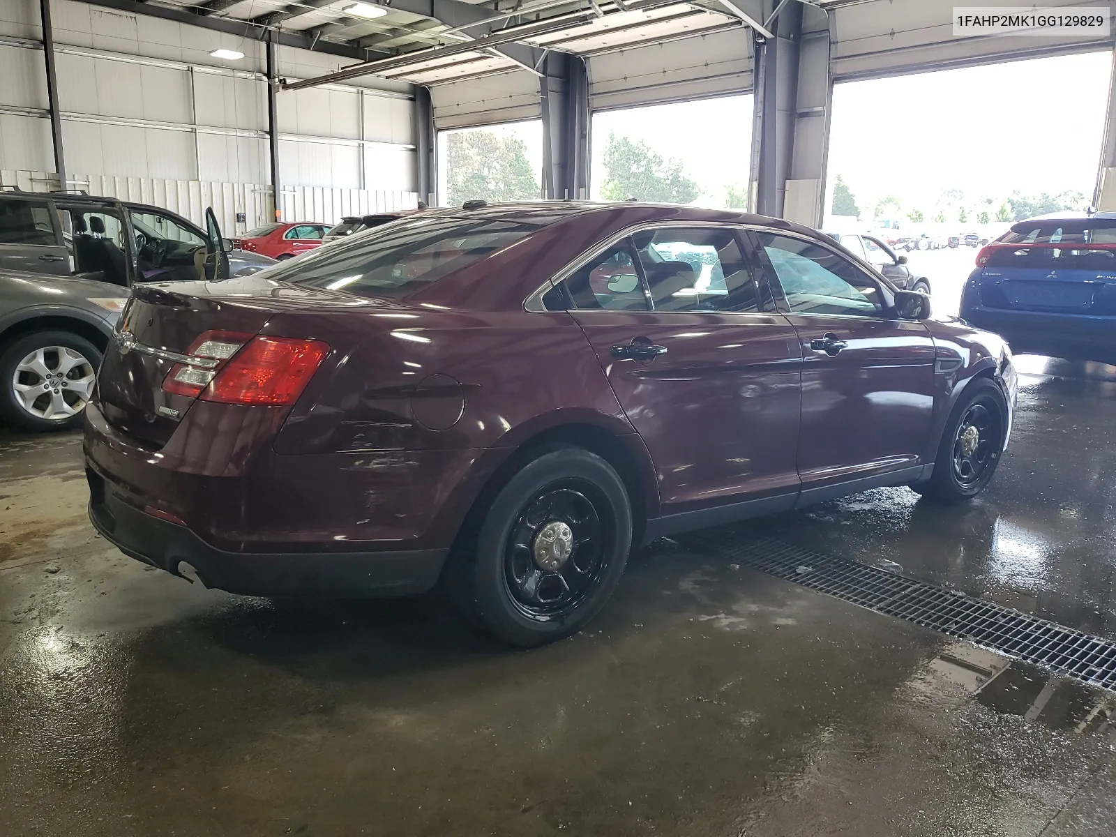 2016 Ford Taurus Police Interceptor VIN: 1FAHP2MK1GG129829 Lot: 64705604