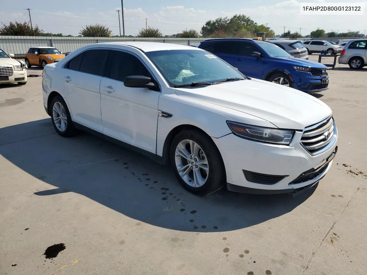 2016 Ford Taurus Se VIN: 1FAHP2D80GG123122 Lot: 65660204