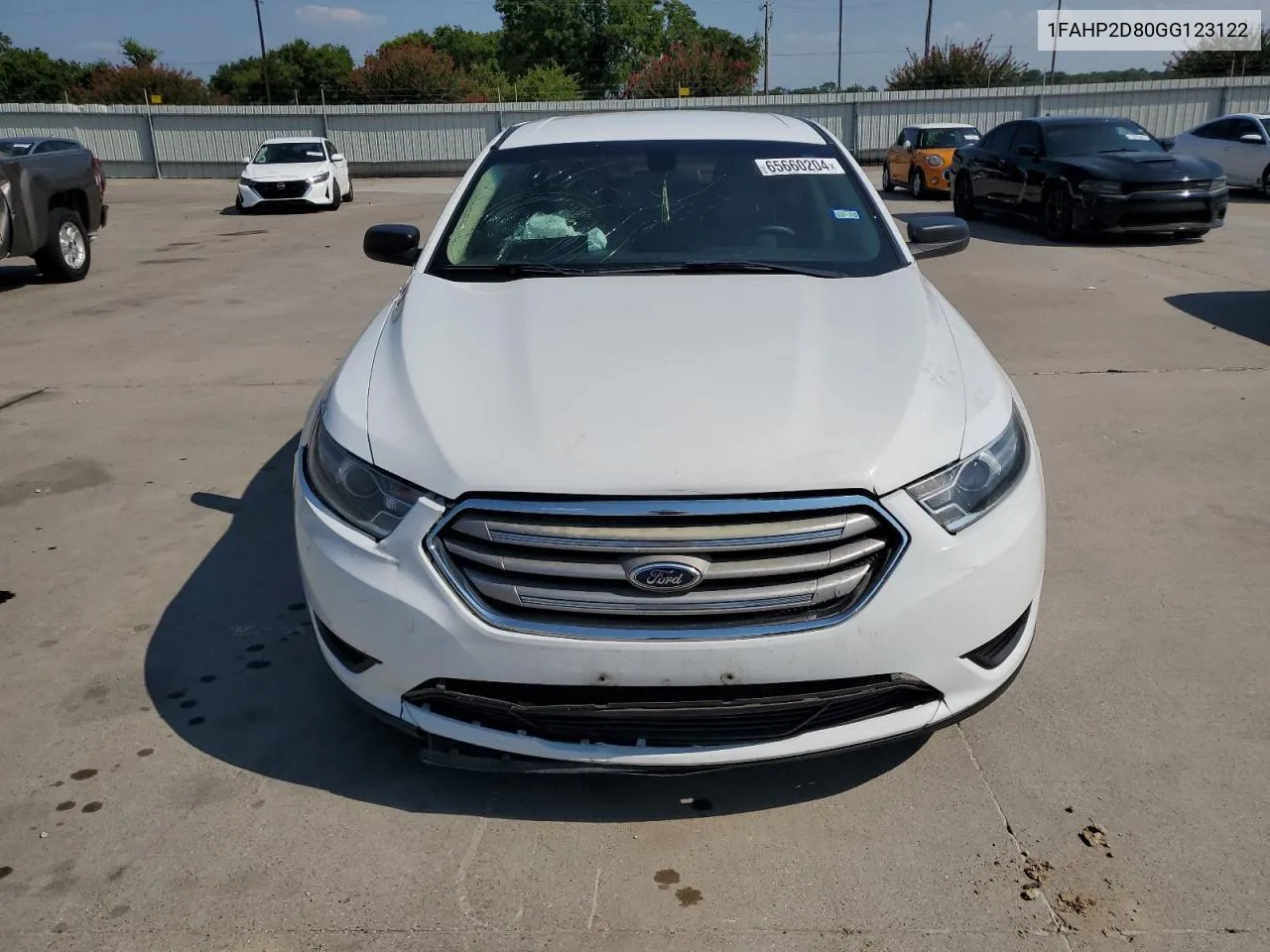 2016 Ford Taurus Se VIN: 1FAHP2D80GG123122 Lot: 65660204