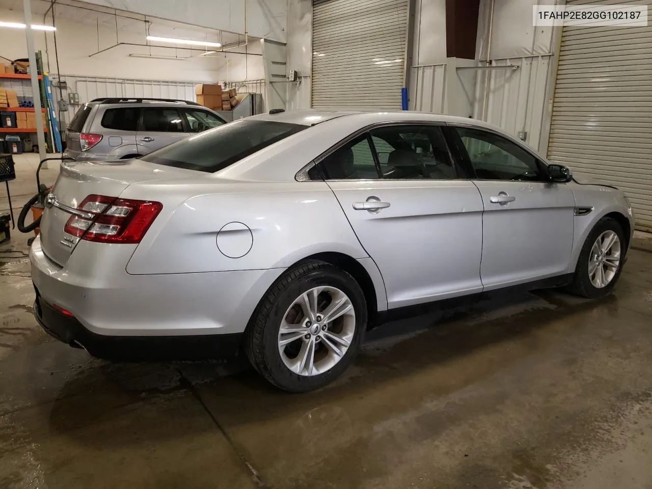 2016 Ford Taurus Sel VIN: 1FAHP2E82GG102187 Lot: 69758974