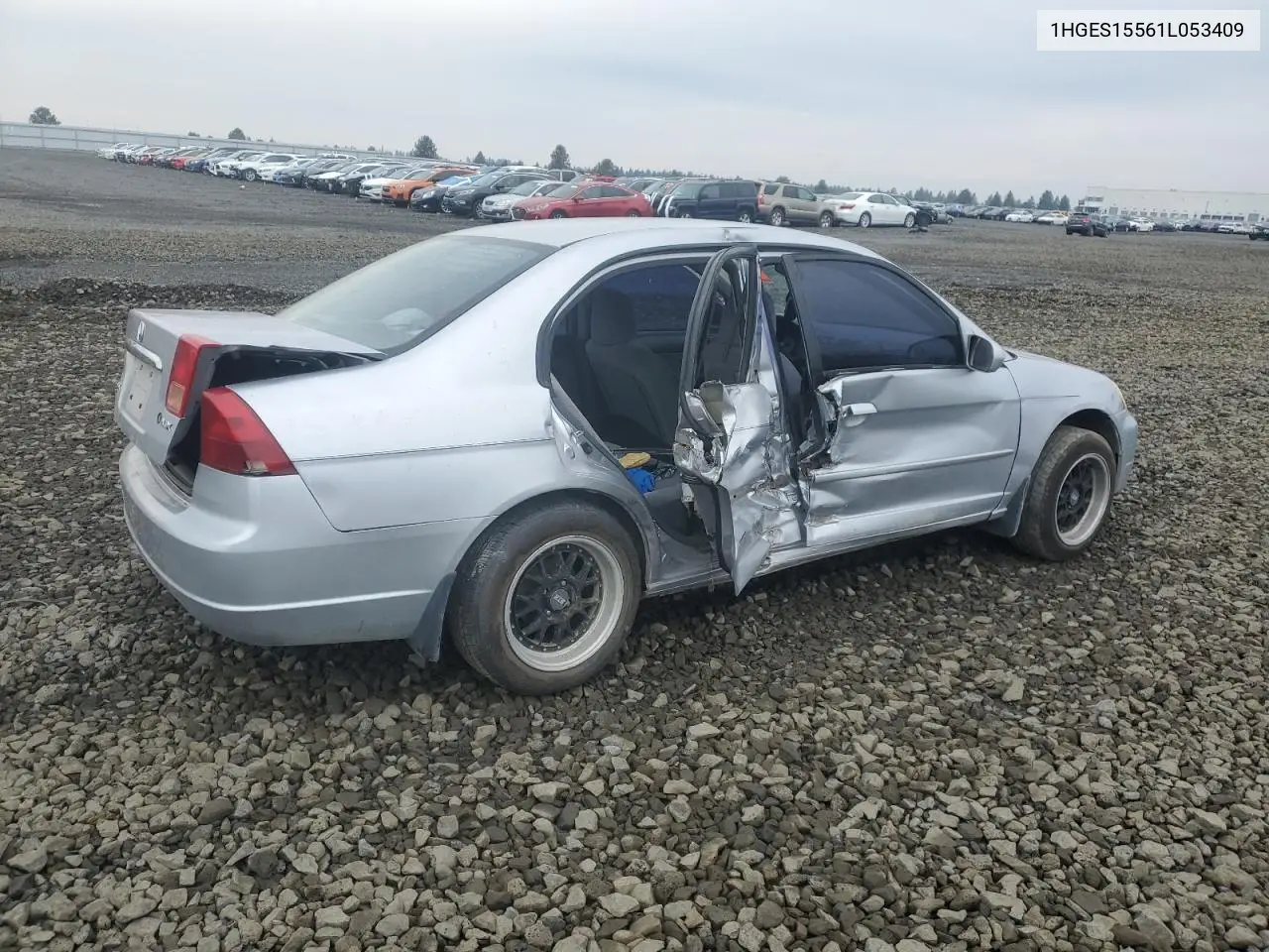 1HGES15561L053409 2001 Honda Civic Lx