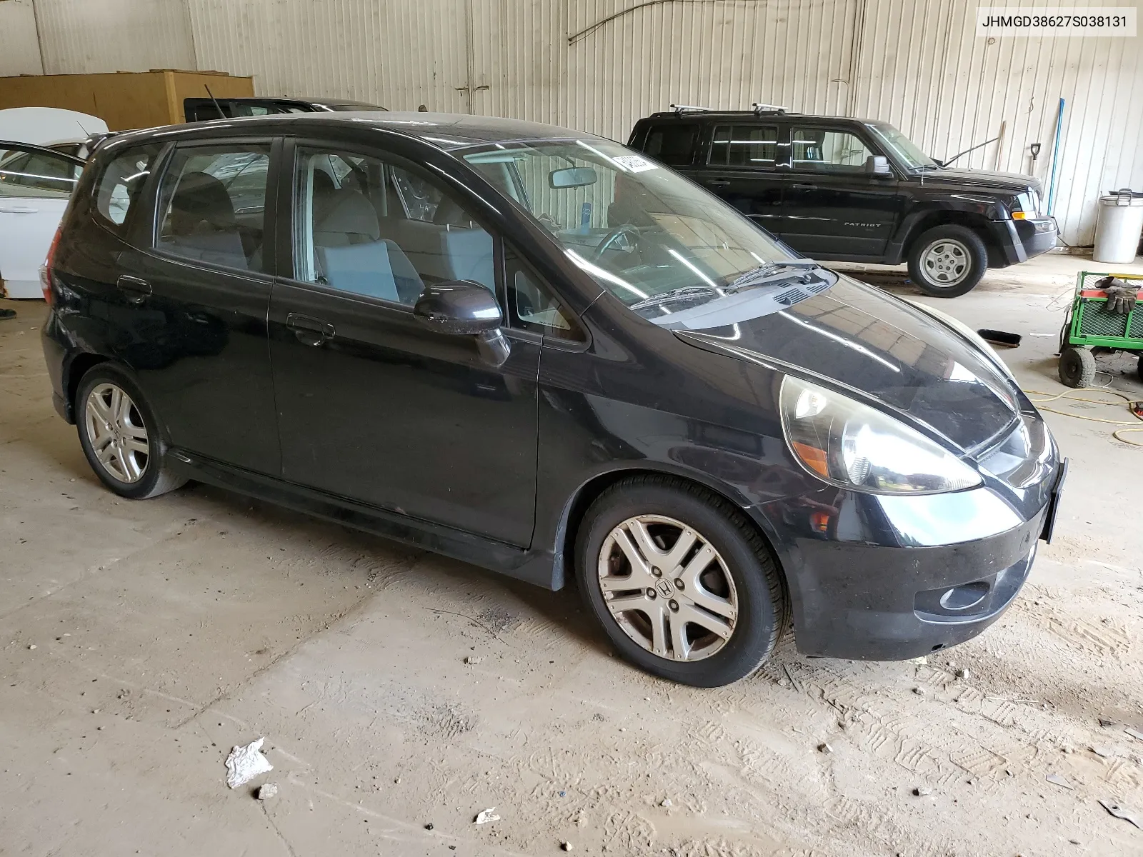 2007 Honda Fit S VIN: JHMGD38627S038131 Lot: 64902864