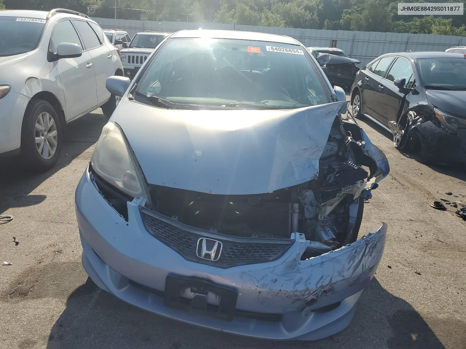 2009 Honda Fit Sport VIN: JHMGE88429S011877 Lot: 64026894