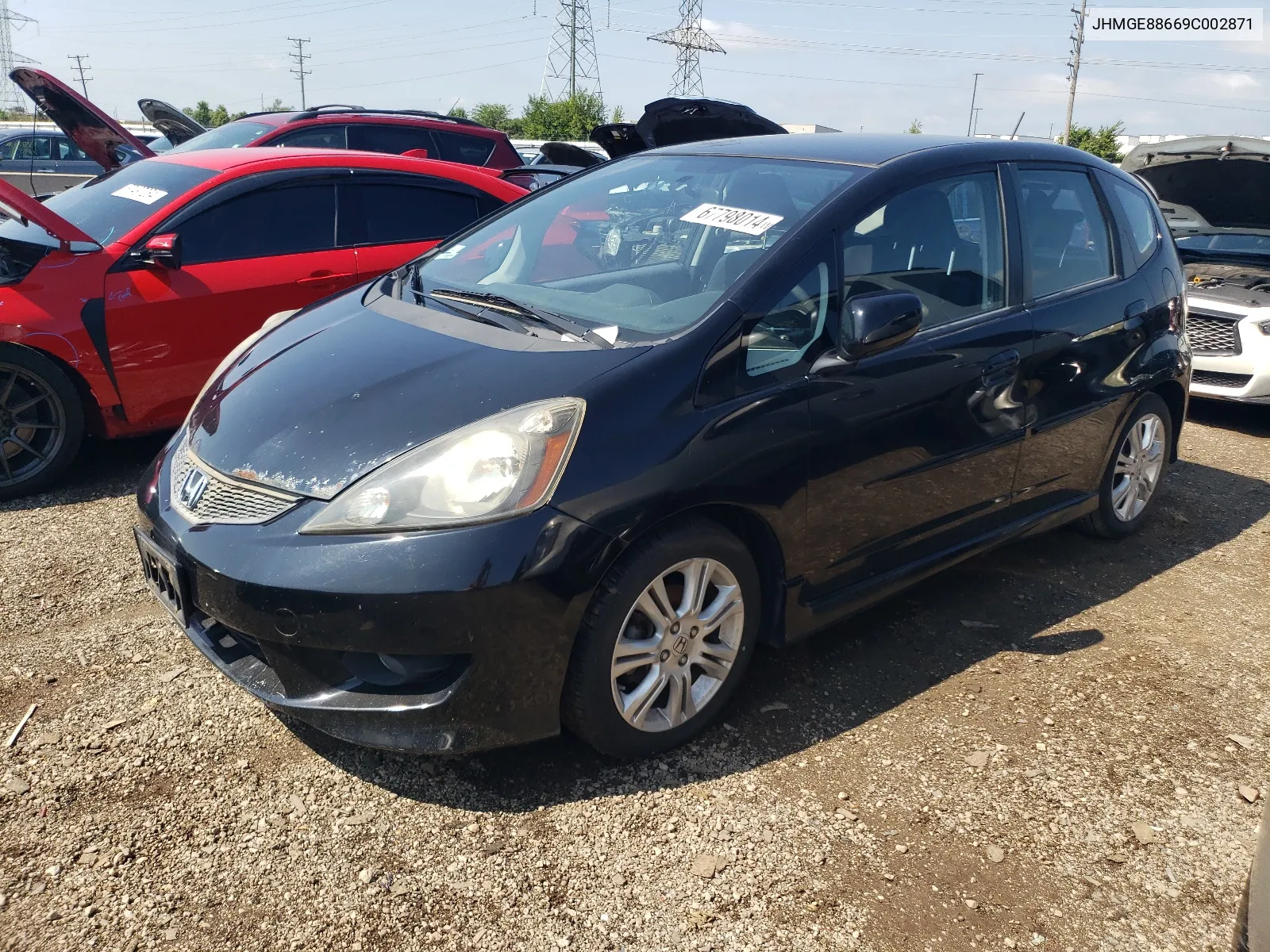 2009 Honda Fit Sport VIN: JHMGE88669C002871 Lot: 67798014