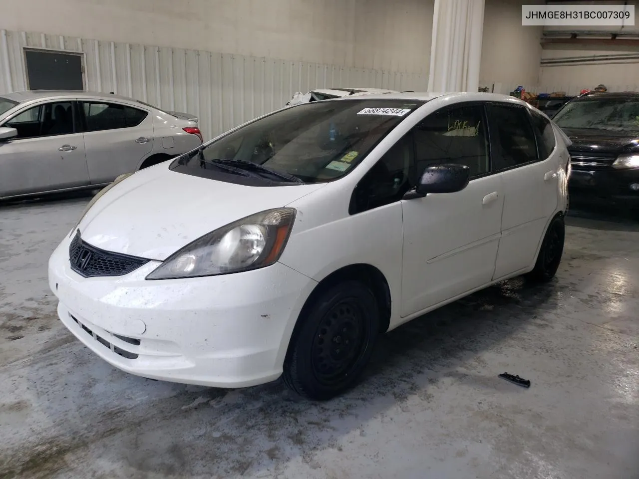 2011 Honda Fit VIN: JHMGE8H31BC007309 Lot: 58874244