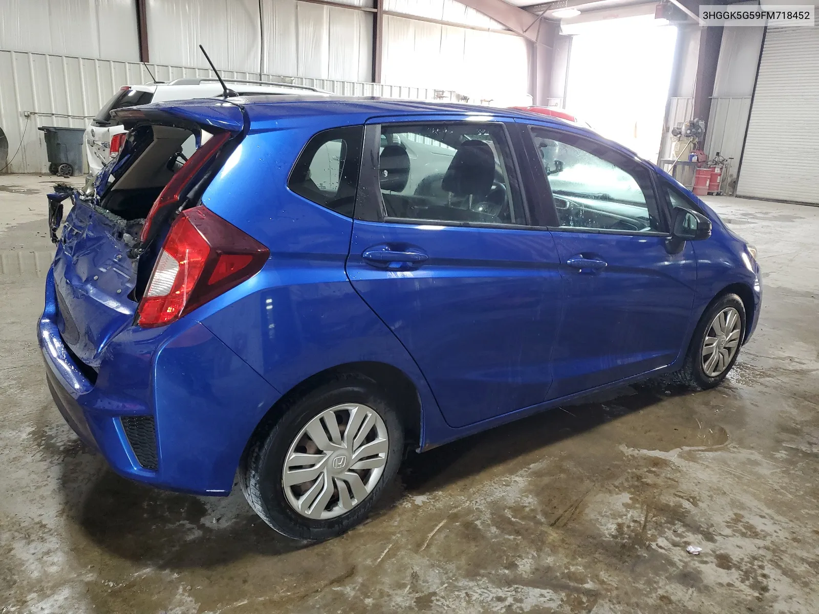 2015 Honda Fit Lx VIN: 3HGGK5G59FM718452 Lot: 64635694