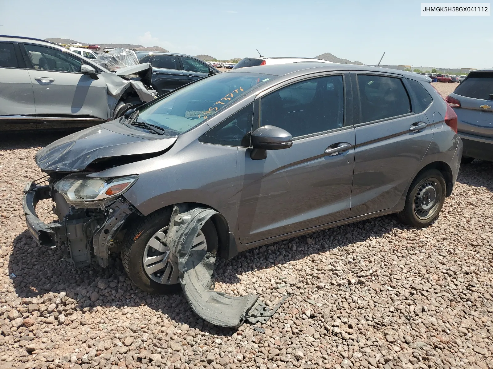 2016 Honda Fit Lx VIN: JHMGK5H58GX041112 Lot: 64593774