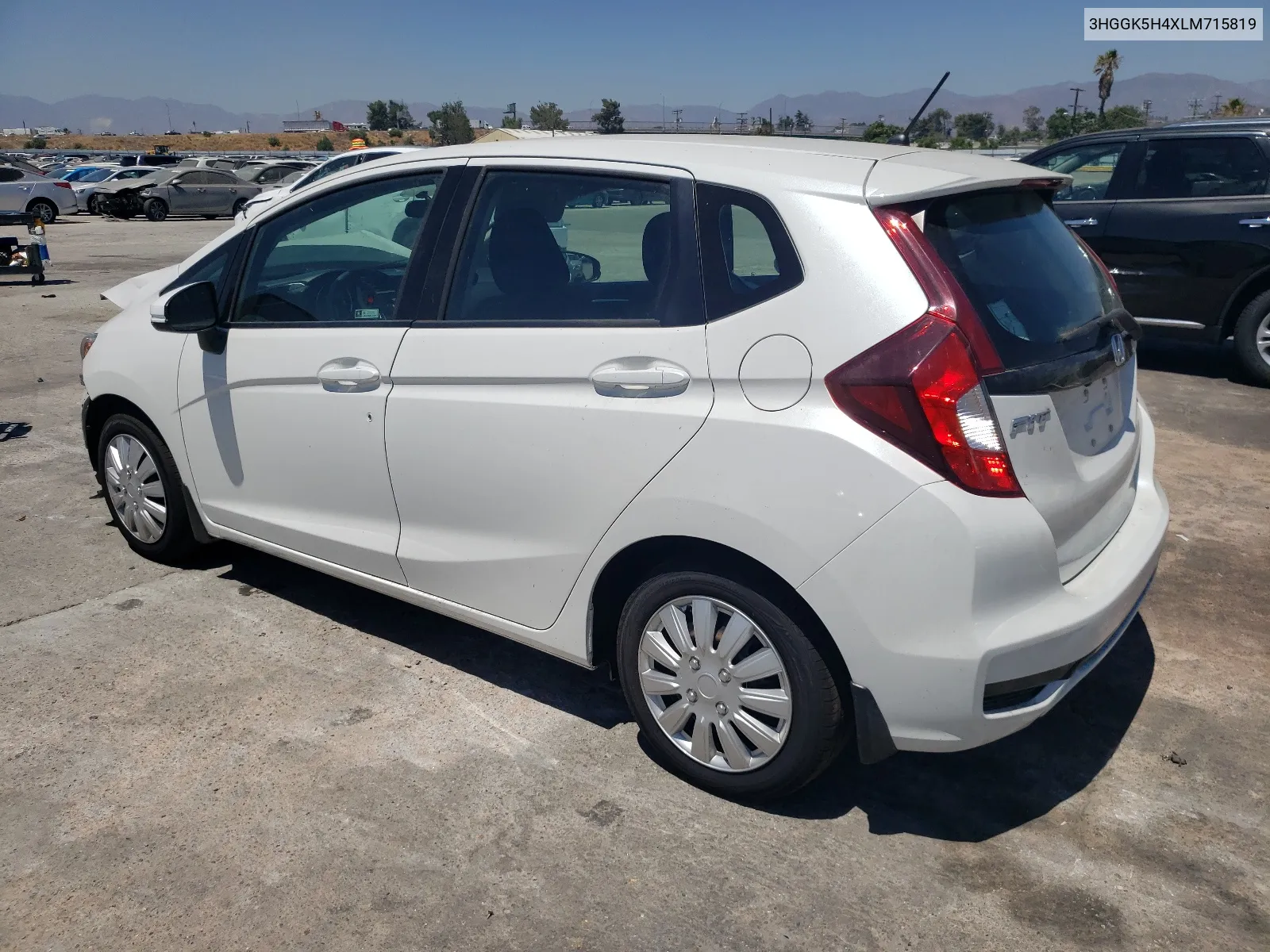 2020 Honda Fit Lx VIN: 3HGGK5H4XLM715819 Lot: 64118544