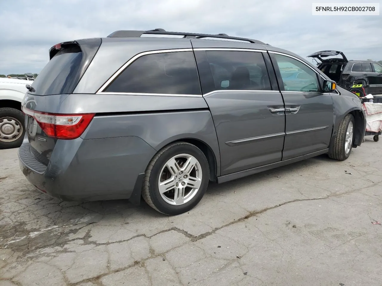 2012 Honda Odyssey Touring VIN: 5FNRL5H92CB002708 Lot: 61824944