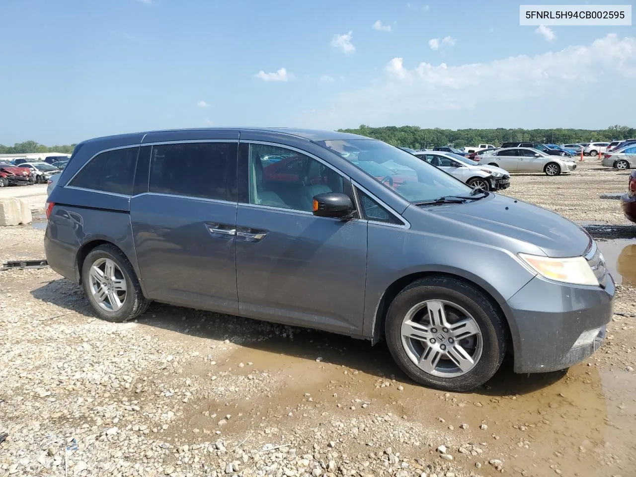 2012 Honda Odyssey Touring VIN: 5FNRL5H94CB002595 Lot: 62660434