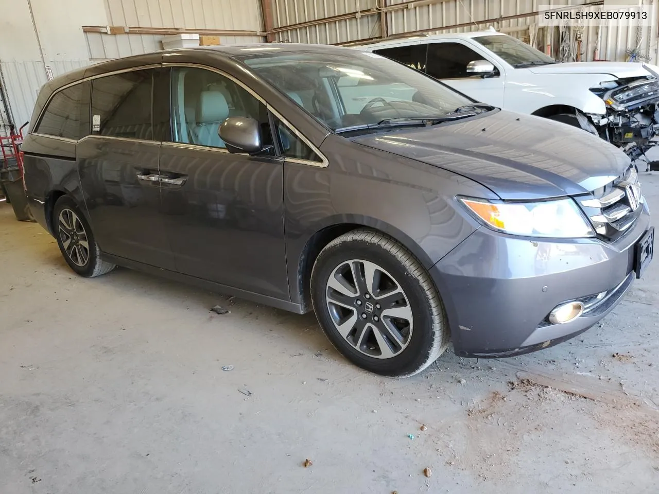 2014 Honda Odyssey Touring VIN: 5FNRL5H9XEB079913 Lot: 69050864