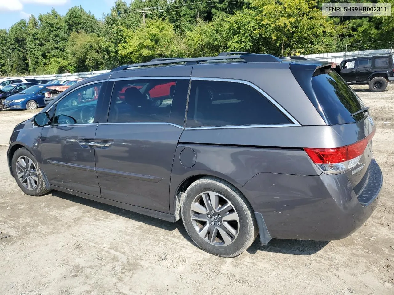 2017 Honda Odyssey Touring VIN: 5FNRL5H99HB002311 Lot: 71960524