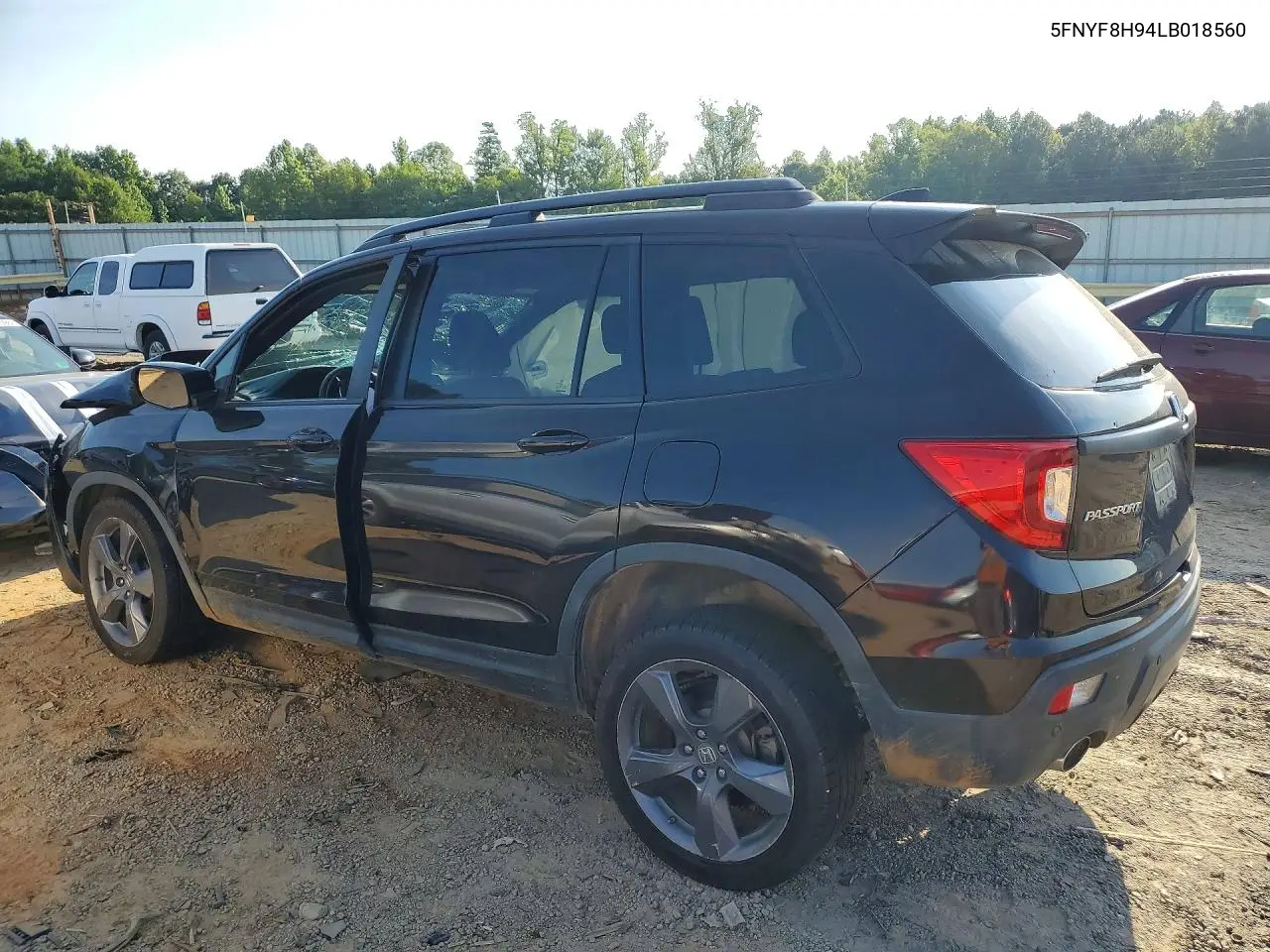 2020 Honda Passport Touring VIN: 5FNYF8H94LB018560 Lot: 55175386
