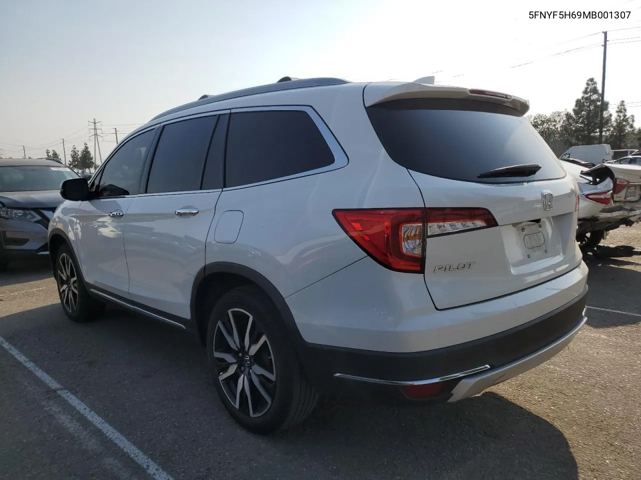 2021 Honda Pilot Touring VIN: 5FNYF5H69MB001307 Lot: 71757804