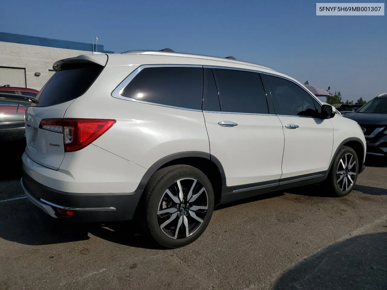 2021 Honda Pilot Touring VIN: 5FNYF5H69MB001307 Lot: 71757804