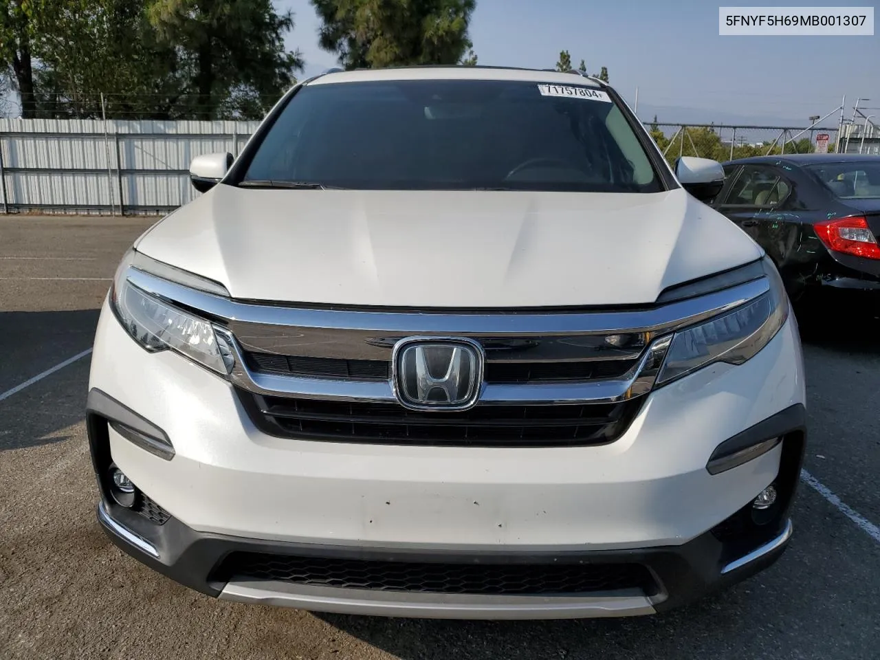 2021 Honda Pilot Touring VIN: 5FNYF5H69MB001307 Lot: 71757804