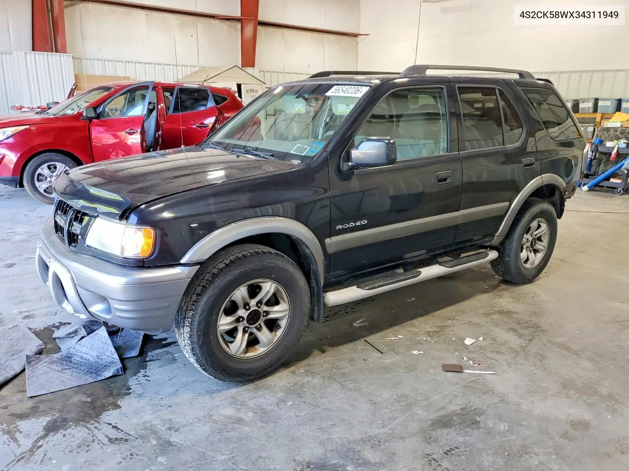 2003 Isuzu Rodeo S VIN: 4S2CK58WX34311949 Lot: 56540236