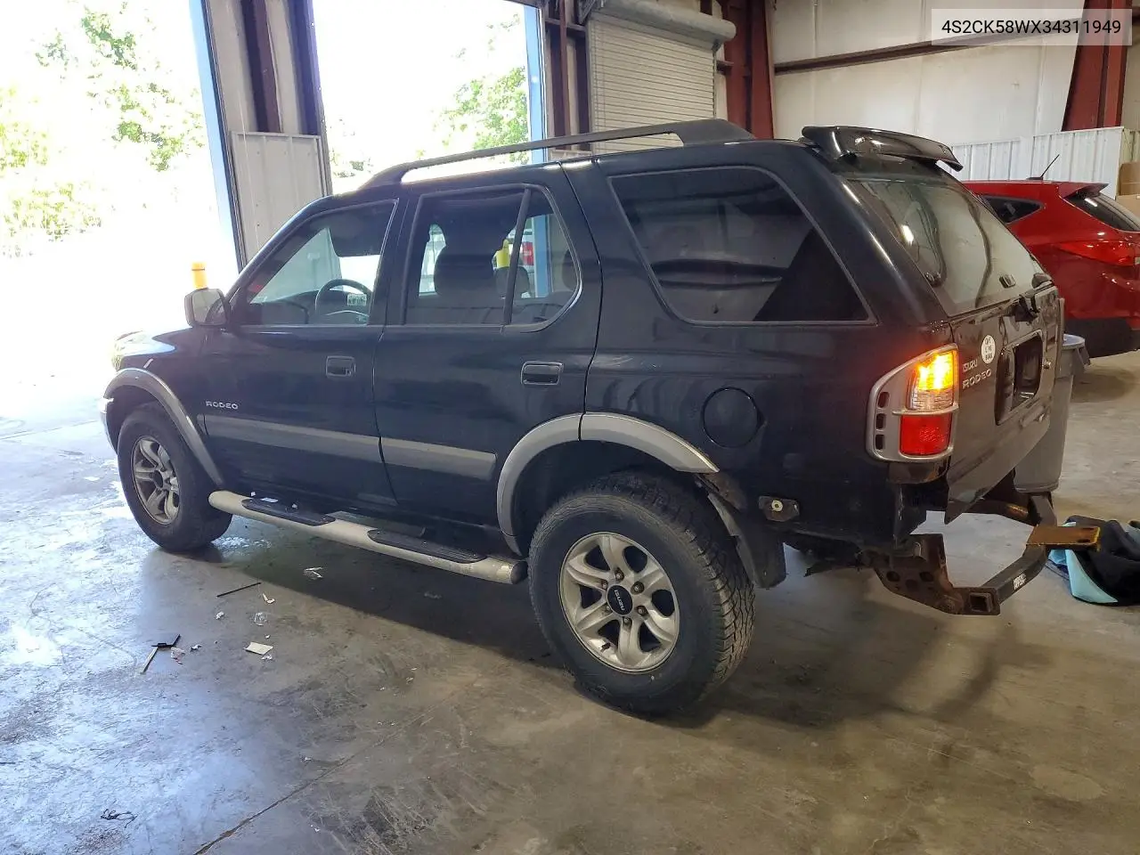 2003 Isuzu Rodeo S VIN: 4S2CK58WX34311949 Lot: 56540236