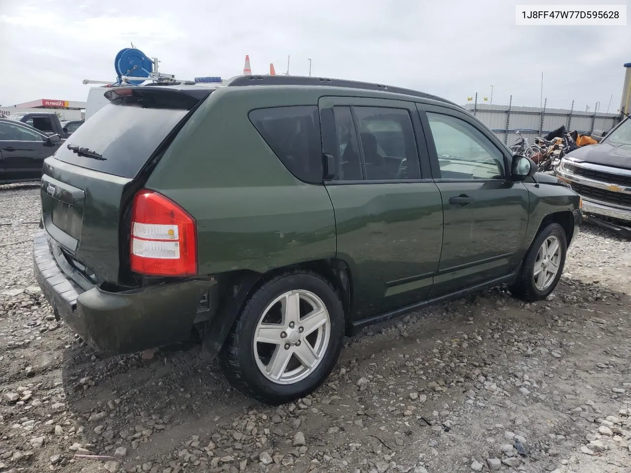 2007 Jeep Compass VIN: 1J8FF47W77D595628 Lot: 69281874