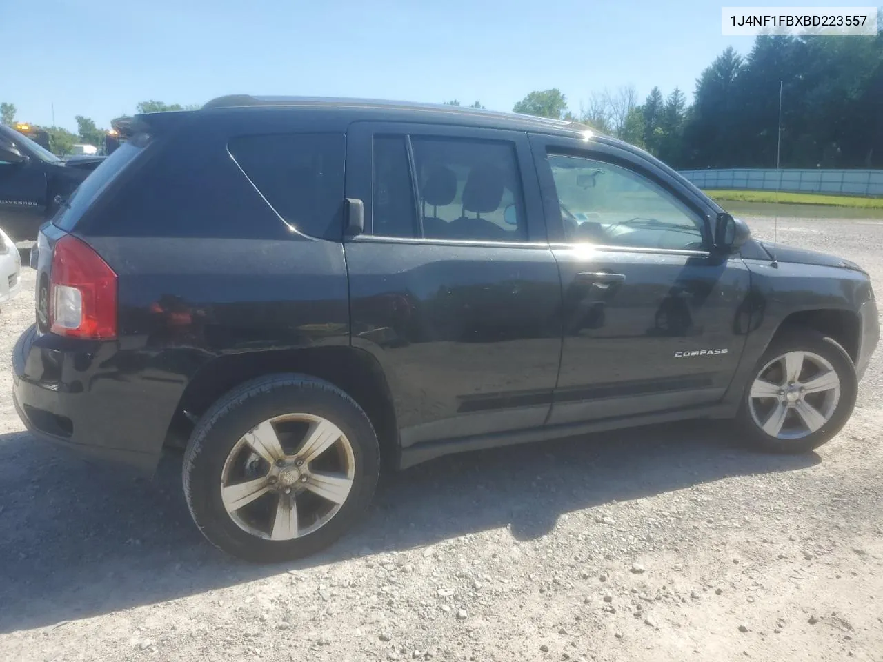 2011 Jeep Compass Sport VIN: 1J4NF1FBXBD223557 Lot: 61443894