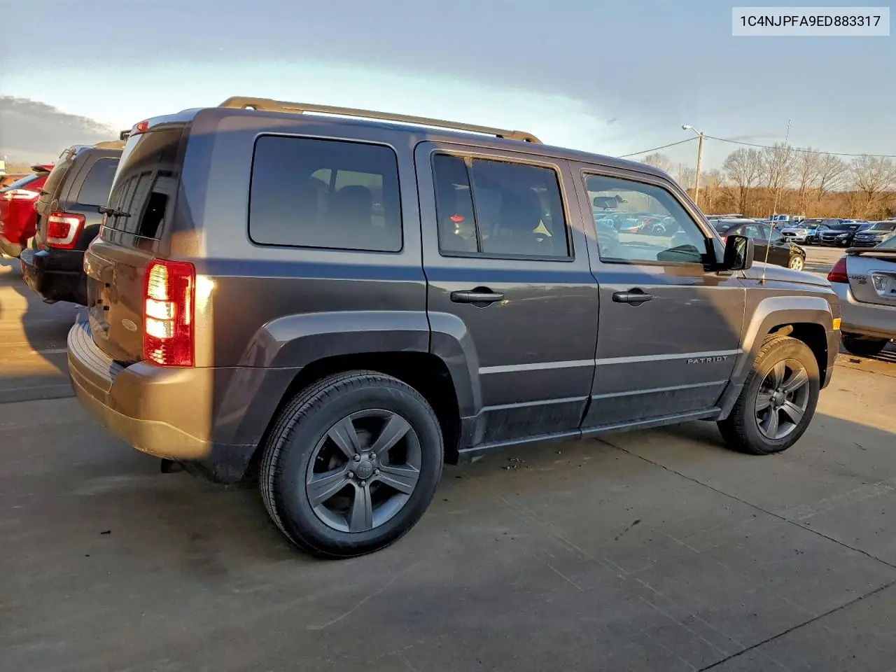 1C4NJPFA9ED883317 2014 Jeep Patriot Latitude