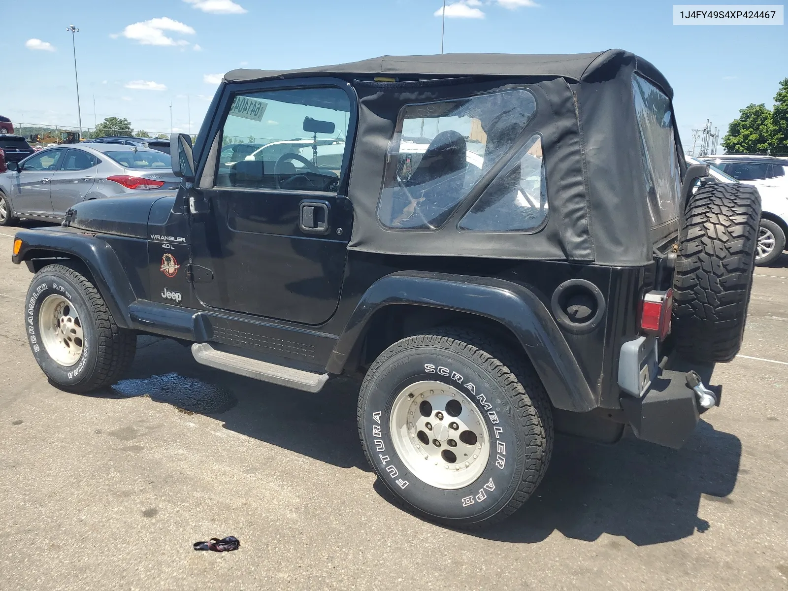 1999 Jeep Wrangler / Tj Sahara VIN: 1J4FY49S4XP424467 Lot: 64140454