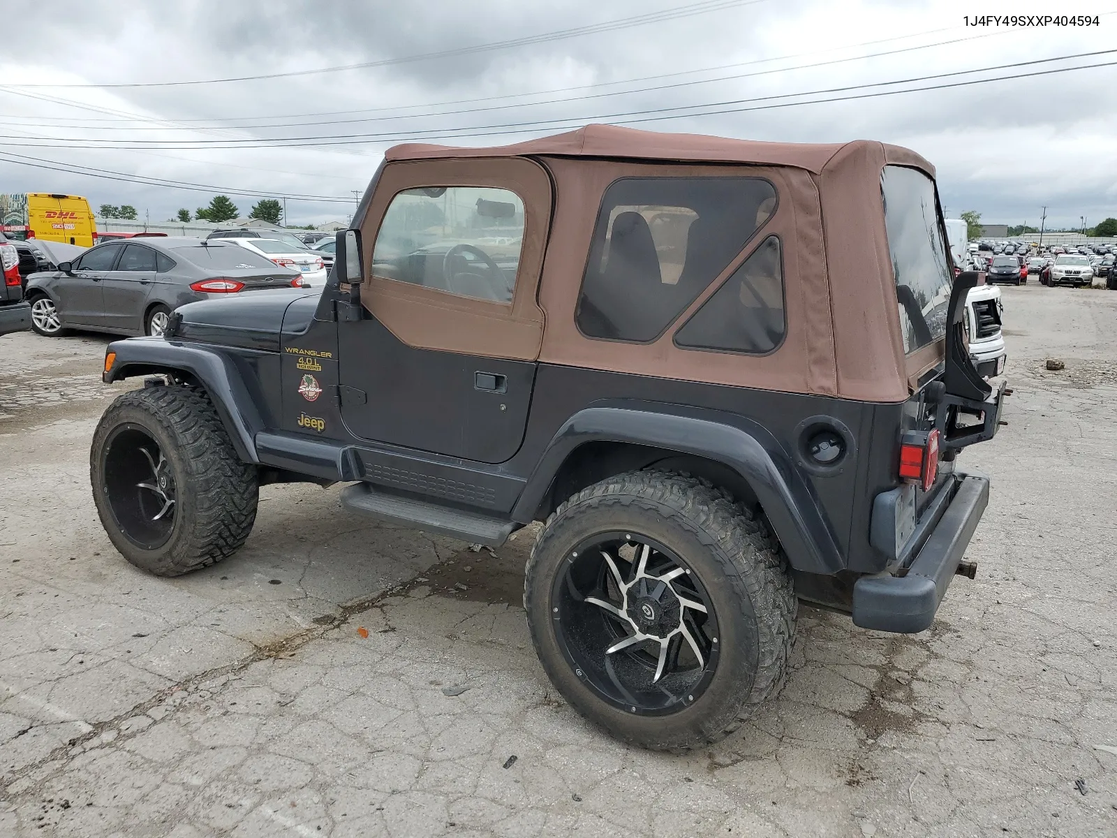 1999 Jeep Wrangler / Tj Sahara VIN: 1J4FY49SXXP404594 Lot: 65126534