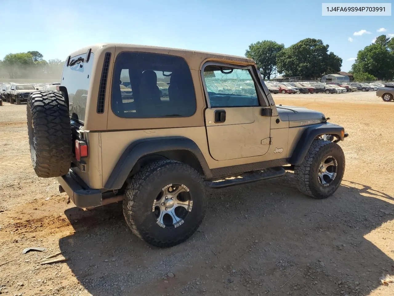 2004 Jeep Wrangler / Tj Rubicon VIN: 1J4FA69S94P703991 Lot: 60516954