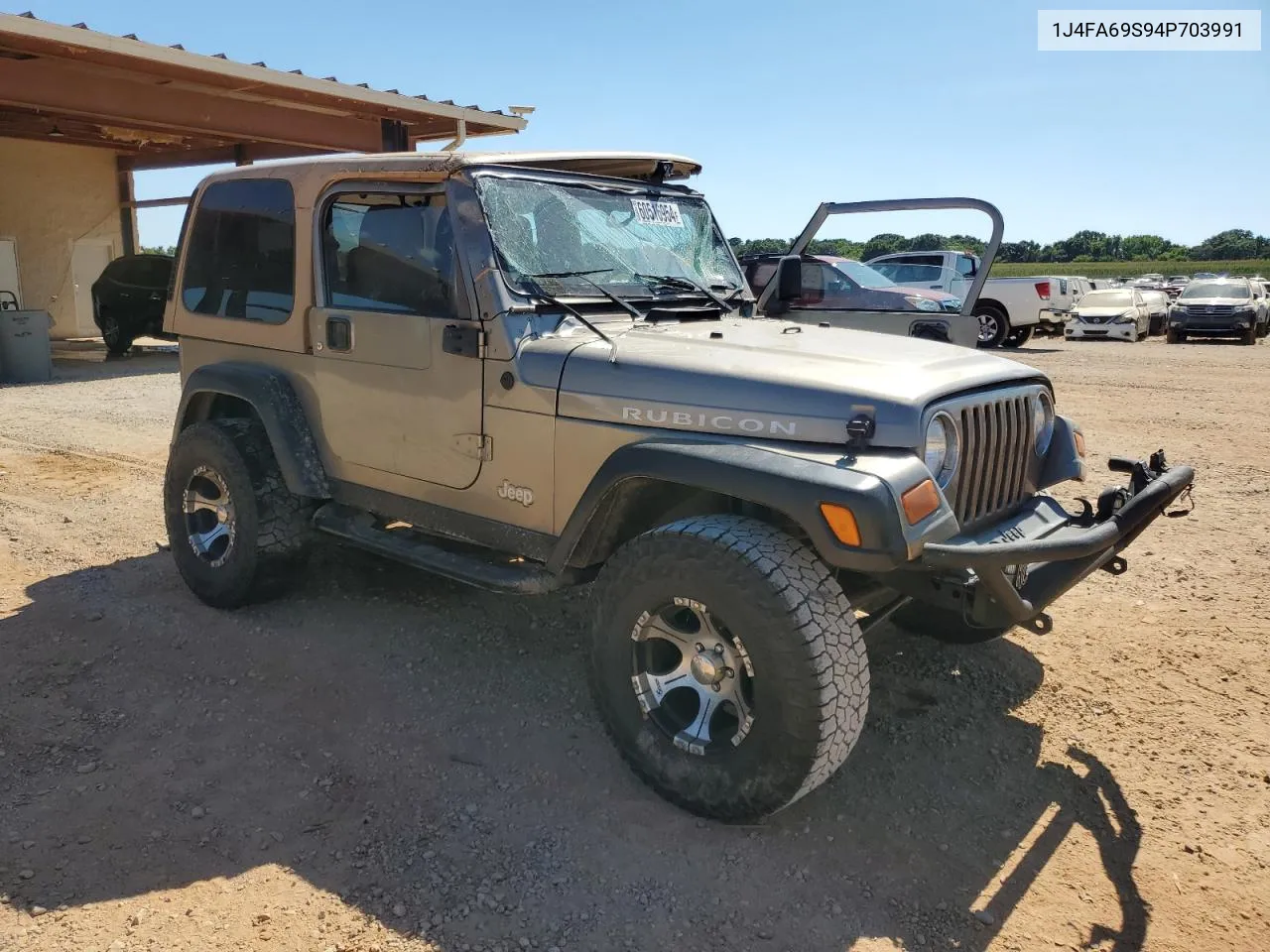 2004 Jeep Wrangler / Tj Rubicon VIN: 1J4FA69S94P703991 Lot: 60516954