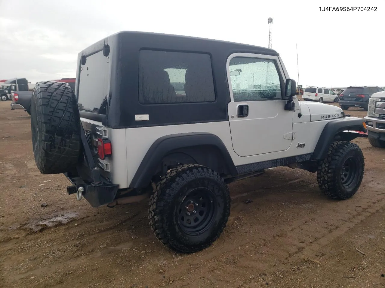 2004 Jeep Wrangler / Tj Rubicon VIN: 1J4FA69S64P704242 Lot: 61909804