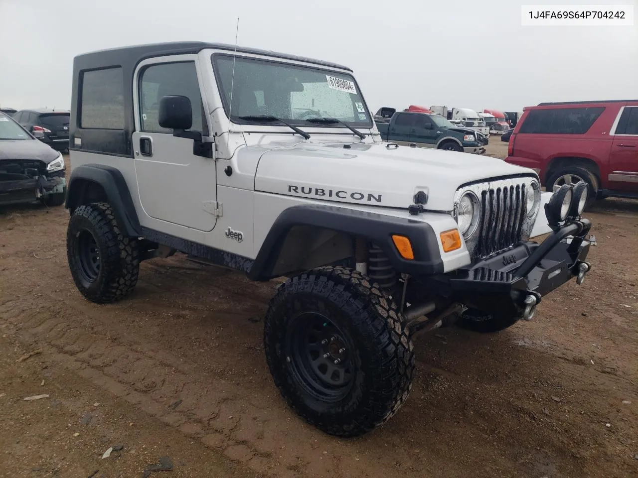 2004 Jeep Wrangler / Tj Rubicon VIN: 1J4FA69S64P704242 Lot: 61909804