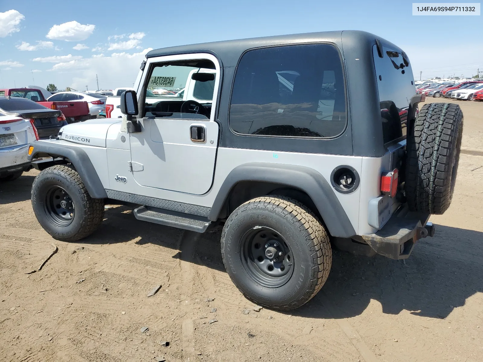 2004 Jeep Wrangler / Tj Rubicon VIN: 1J4FA69S94P711332 Lot: 64393734