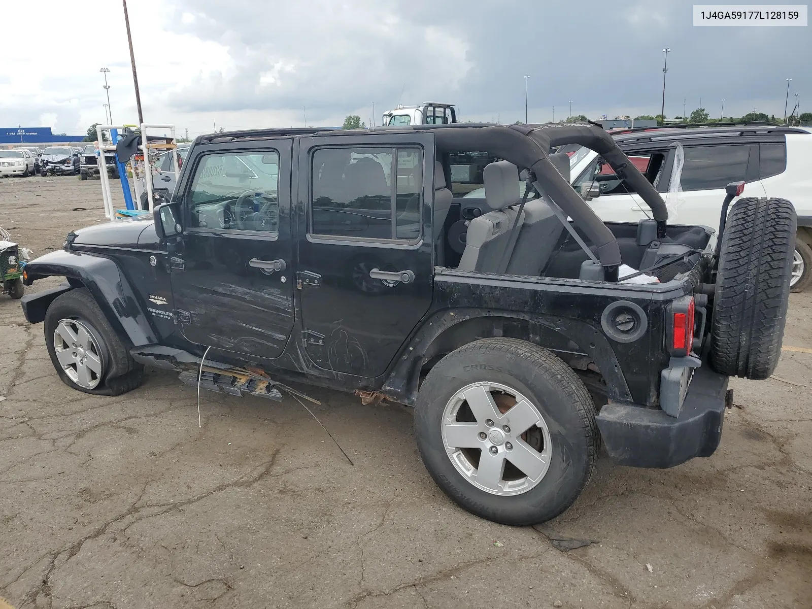 2007 Jeep Wrangler Sahara VIN: 1J4GA59177L128159 Lot: 62088234