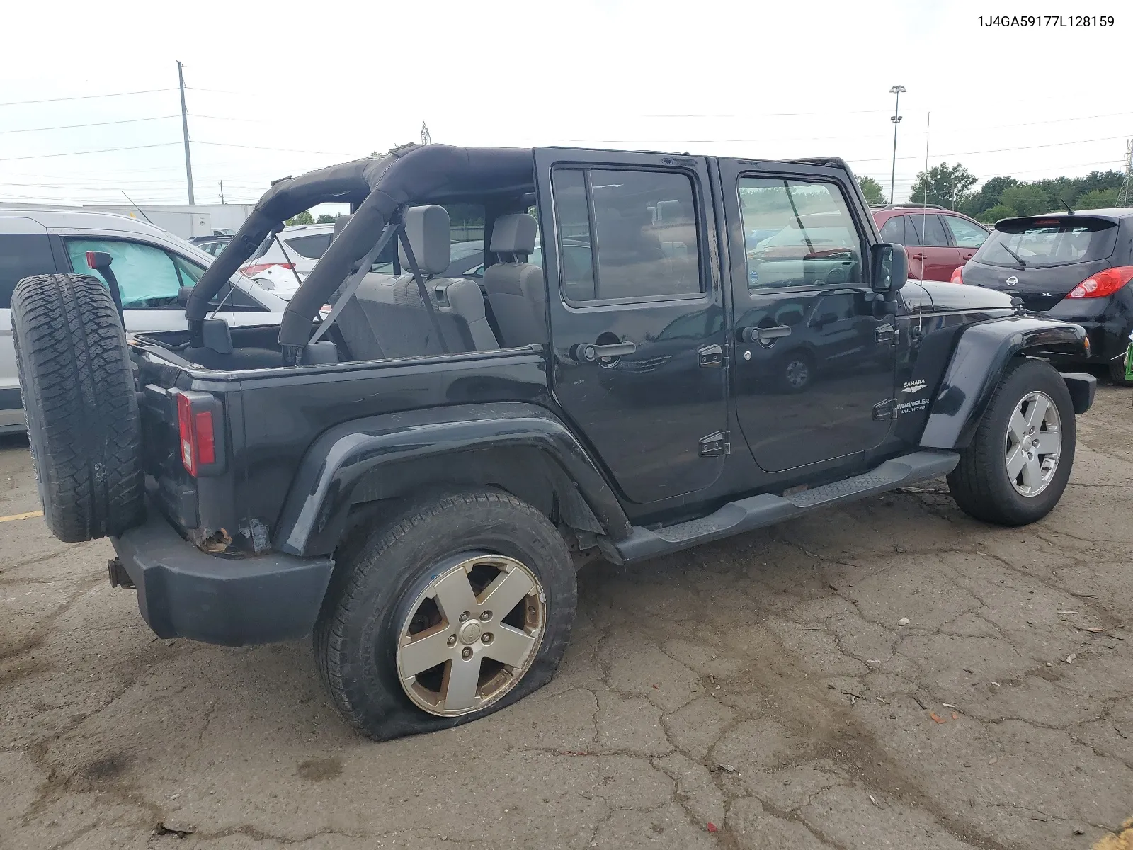 2007 Jeep Wrangler Sahara VIN: 1J4GA59177L128159 Lot: 62088234