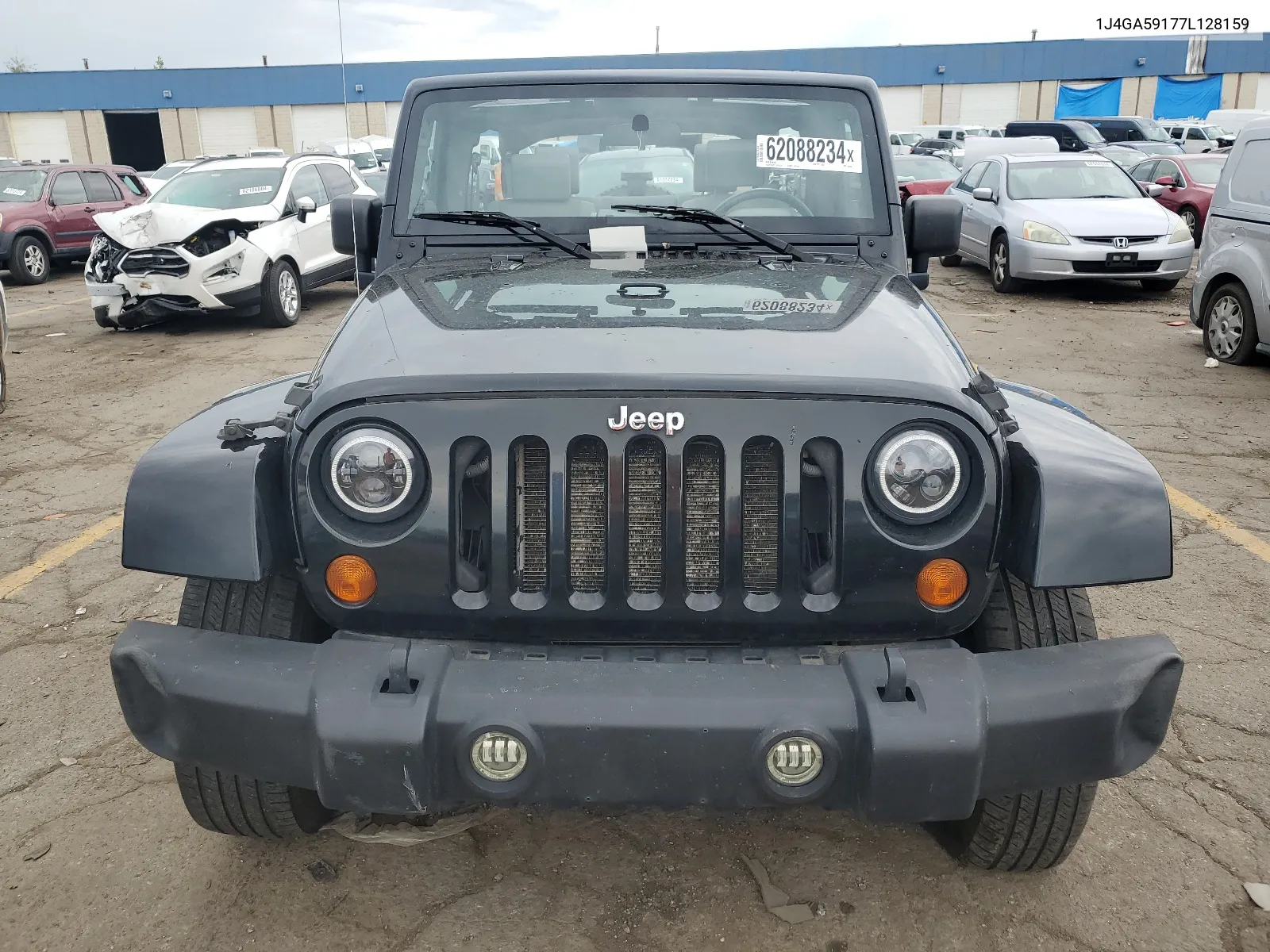 2007 Jeep Wrangler Sahara VIN: 1J4GA59177L128159 Lot: 62088234