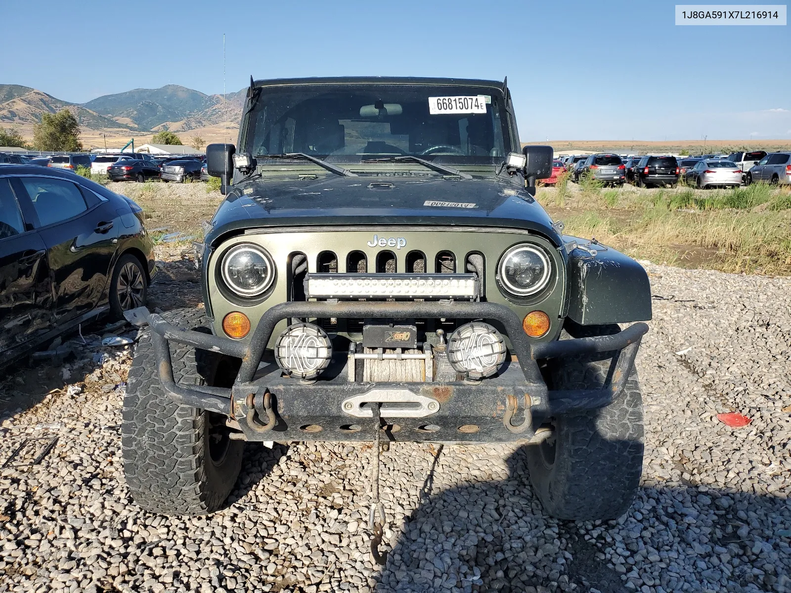 2007 Jeep Wrangler Sahara VIN: 1J8GA591X7L216914 Lot: 66815074