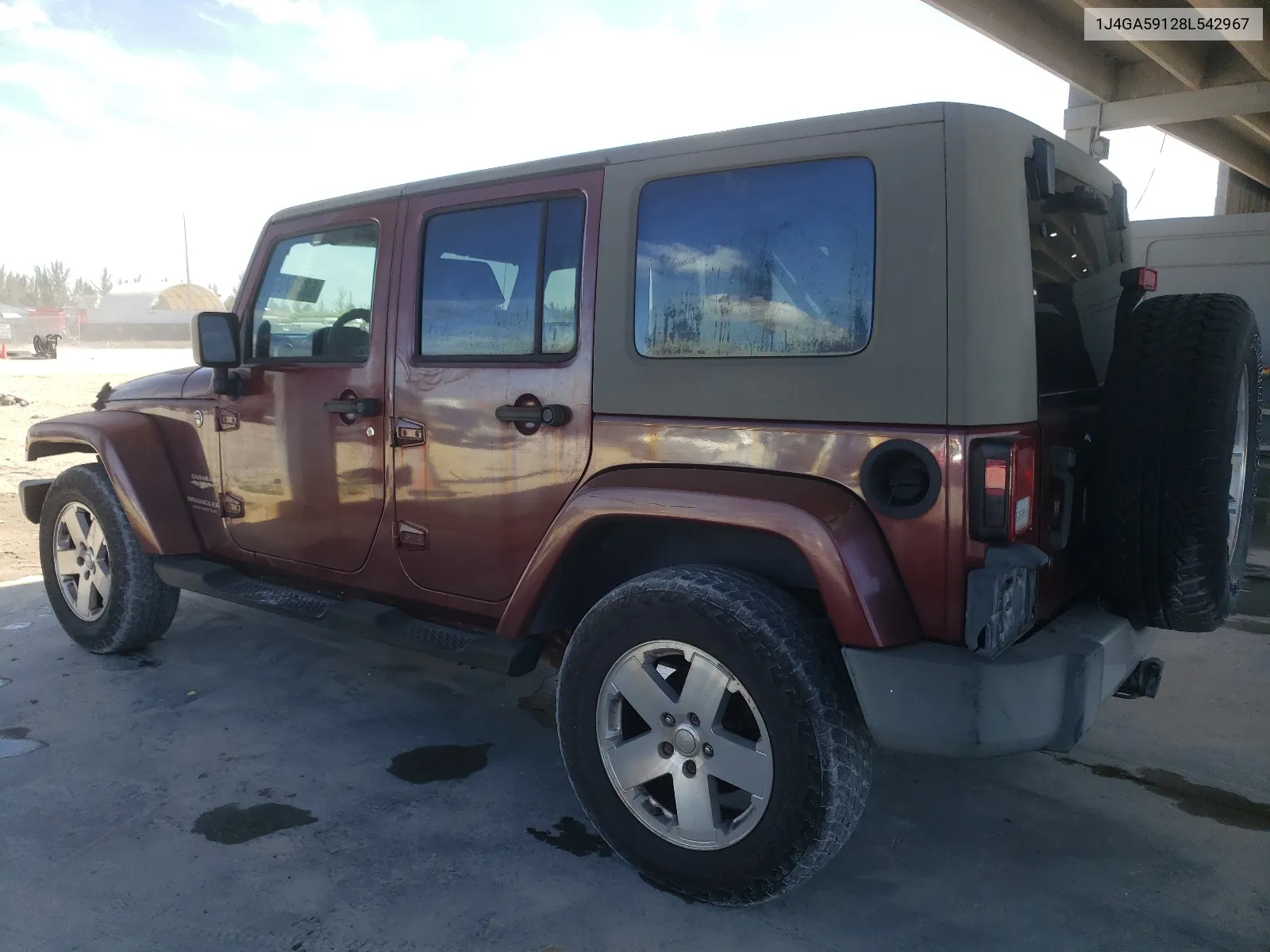 2008 Jeep Wrangler Unlimited Sahara VIN: 1J4GA59128L542967 Lot: 63357094