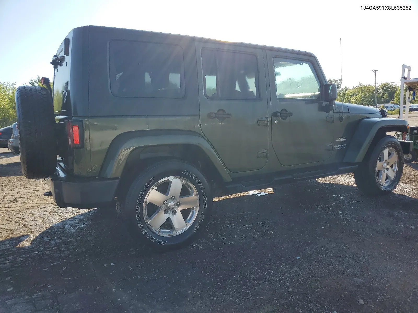 2008 Jeep Wrangler Unlimited Sahara VIN: 1J4GA591X8L635252 Lot: 66436964