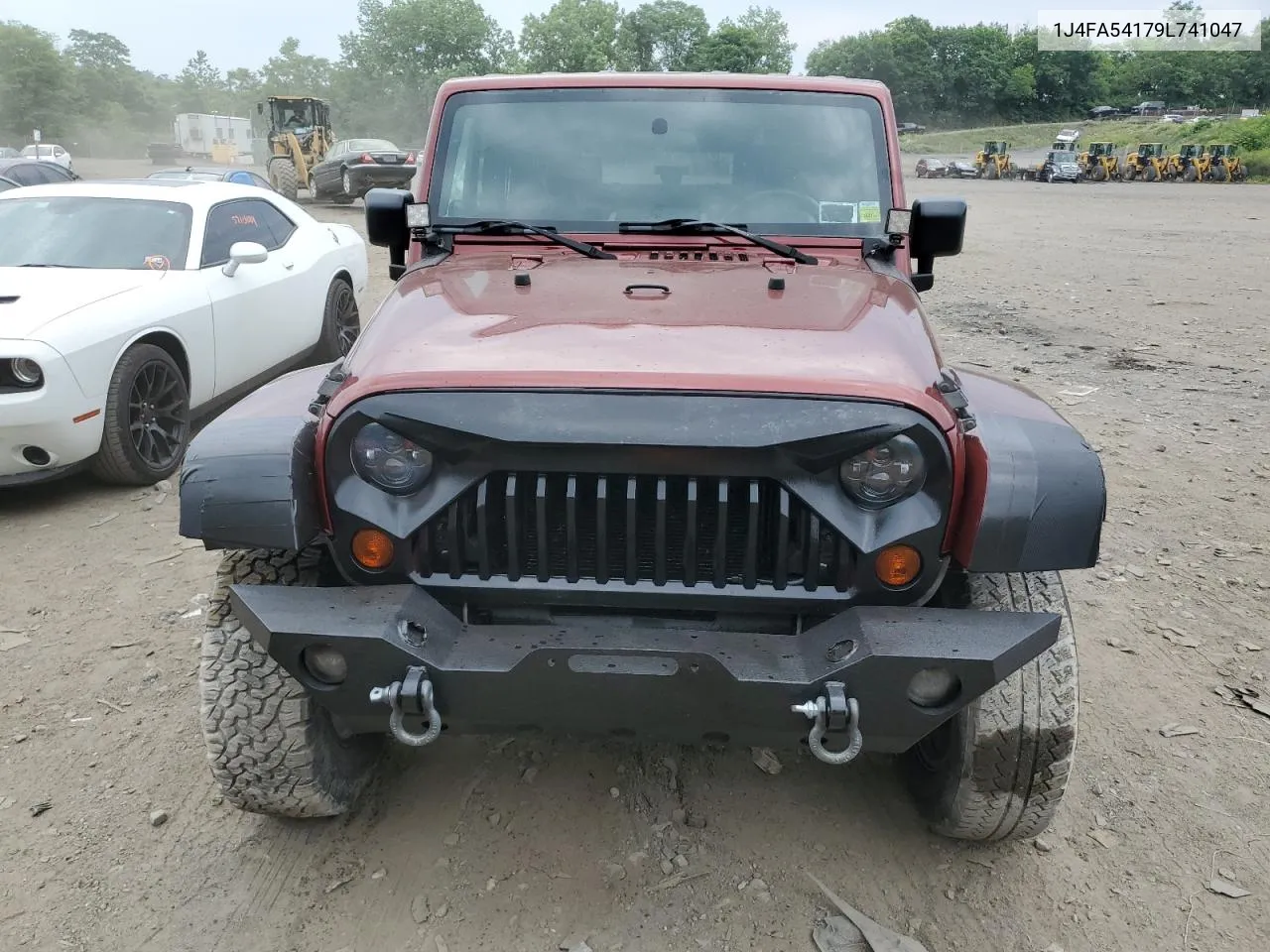 2009 Jeep Wrangler Sahara VIN: 1J4FA54179L741047 Lot: 59317664