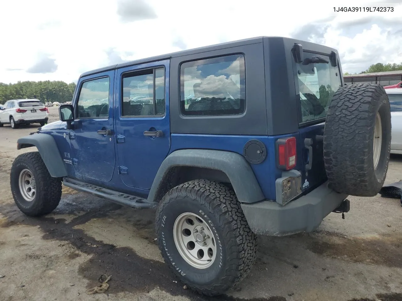 2009 Jeep Wrangler Unlimited X VIN: 1J4GA39119L742373 Lot: 60749144