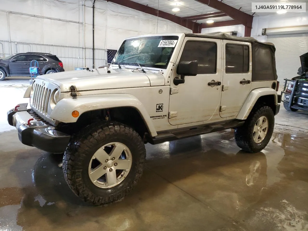 2009 Jeep Wrangler Unlimited Sahara VIN: 1J4GA59119L778964 Lot: 61563994