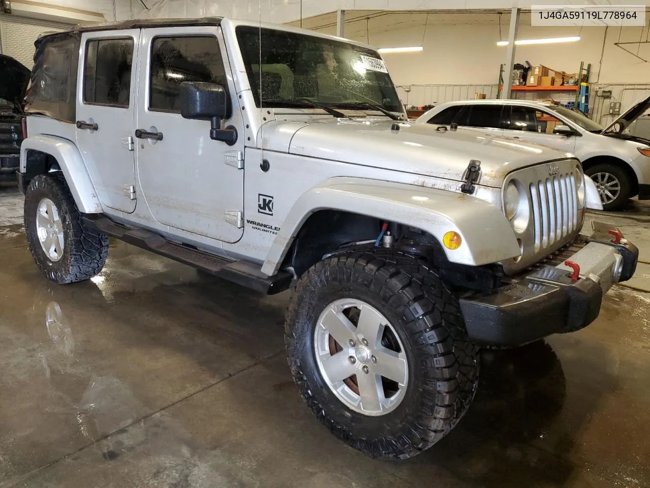 2009 Jeep Wrangler Unlimited Sahara VIN: 1J4GA59119L778964 Lot: 61563994